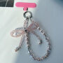 Masnis és gyöngyös pánt iPhone tokra való rögzítéshez - rózsaszín